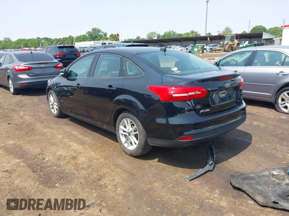 2017 Ford Focus SE with VIN 1FADP3F25HL292056, listed as a IAAI auction lot 42409320 with 102,956 mi miles and . Bid and sale history available at DreamBid. Image 3.