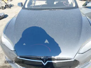 2014 Tesla Model S 60 with VIN 5YJSA1S11EFP35998, listed as a IAAI auction lot 42316563 with 83,835 mi miles and . Bid and sale history available at DreamBid. Image 10.