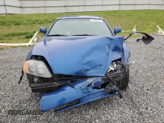 2004 Hyundai Tiburon GT z VIN KMHHN65F04U116166, wystawiony jako Copart lot #51525065 z przebiegiem 153 035 mil mil oraz Szkody całkowita. Historia ofert i sprzedaży dostępna na DreamBid. Obrazek 5.