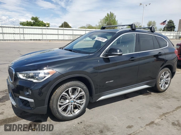 2017 BMW X1 xDrive28i with VIN WBXHT3Z38H4A58005, listed as a Copart auction lot 55837805 with 50,318 mi miles and Salvage title. Bid and sale history available at DreamBid. Image 1.
