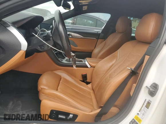 2020 BMW 8 Series M850i with VIN WBAGV8C00LCD38284, listed as a Copart auction lot 60605075 with 57,161 mi miles and Salvage title. Bid and sale history available at DreamBid. Image 7.