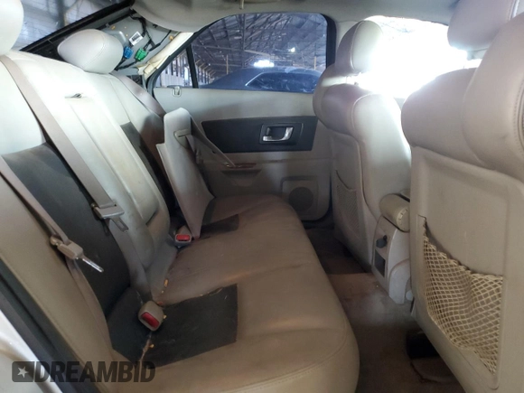 2004 Cadillac CTS with VIN 1G6DM577640135532, listed as a Copart auction lot 69127954 with 0 mi miles and Salvage Title. Bid and sale history available at carsss.com. Image 10.