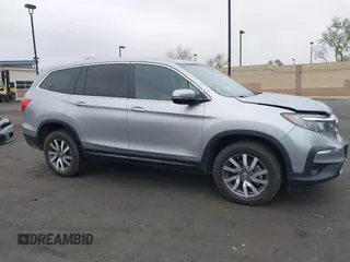 2019 Honda Pilot EX-L with VIN 5FNYF6H54KB055687, listed as a IAAI auction lot 42050539 with 50,989 mi miles and . Bid and sale history available at carsss.com. Image 14.