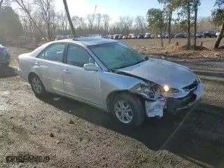 2004 Toyota Camry LE with VIN 4T1BF32K14U577850, listed as a Copart auction lot 72275852 with 205,652 mi miles and Salvage Title. Bid and sale history available at carsss.com. Image 11.