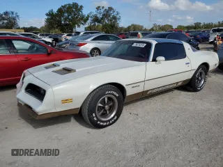 1978 Pontiac Firebird z VIN 2U87K8L123850, wystawiony jako Copart lot #79076374 z przebiegiem 64 829 mil mil oraz Szkody całkowita. Historia ofert i sprzedaży dostępna na DreamBid. Obrazek 1.