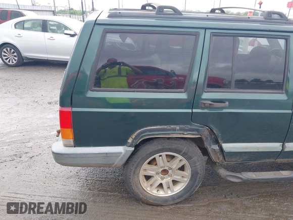 2000 Jeep Cherokee with VIN 1J4FT48S4YL240347, listed as a IAAI auction lot 42361311 with Not provided miles and . Bid and sale history available at DreamBid. Image 12.
