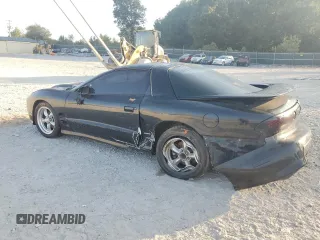 2000 Pontiac Firebird Formula z VIN 2G2FV22G4Y2175318, wystawiony jako Copart lot #68737224 z przebiegiem 229 394 mil mil oraz Szkoda całkowita • Salvage title. Historia ofert i sprzedaży dostępna na DreamBid. Obrazek 2.
