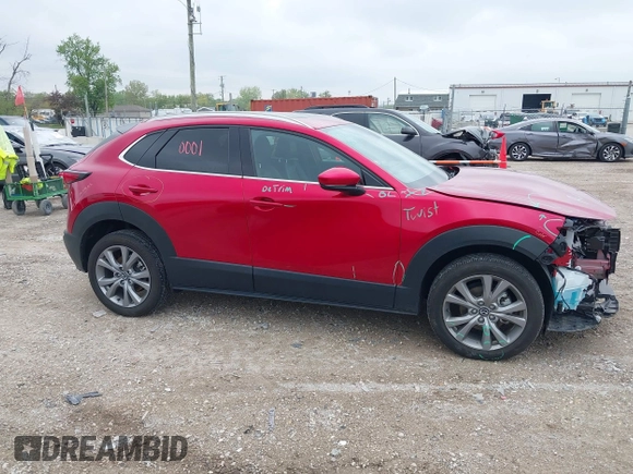 2023 Mazda CX-30 S Premium with VIN 3MVDMBDM3PM511402, listed as a IAAI auction lot 42180001 with 6,189 mi miles and . Bid and sale history available at DreamBid. Image 14.