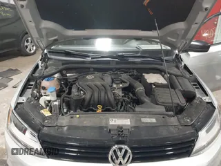 2014 Volkswagen Jetta S z VIN 3VW2K7AJXEM208116, wystawiony jako IAAI lot #42076606 z przebiegiem 118 917 mil mil oraz . Historia ofert i sprzedaży dostępna na DreamBid. Obrazek 10.