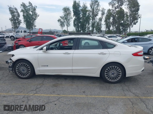 2013 Ford Fusion Titanium Hybrid with VIN 3FA6P0RUXDR386675, listed as a IAAI auction lot 42013986 with 89,349 mi miles. Bid and sale history available at carsss.com. Image 15.
