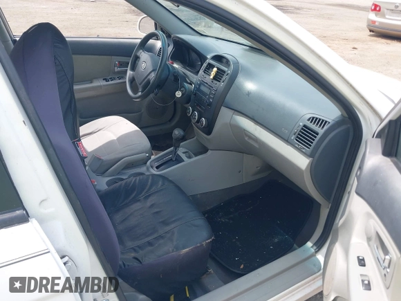 2009 Kia Spectra EX with VIN KNAFE221595606467, listed as a IAAI auction lot 42484042 with 217,439 mi miles and . Bid and sale history available at DreamBid. Image 5.