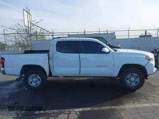 2017 Toyota Tacoma SR with VIN 5TFAX5GN4HX092764, listed as a IAAI auction lot 41708434 with 114,607 mi miles. Bid and sale history available at carsss.com. Image 14.