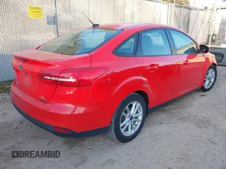2016 Ford Focus SE with VIN 1FADP3F27GL271322, listed as a IAAI auction lot 41445039 with 100,195 mi miles. Bid and sale history available at carsss.com. Image 4.