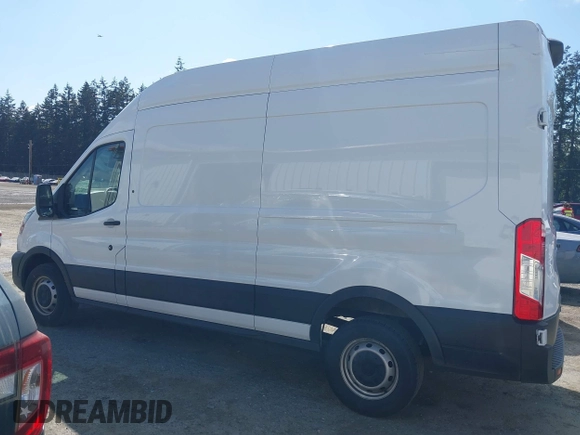 2023 Ford Transit Cargo with VIN 1FTBR1X84PKB02027, listed as a IAAI auction lot 42062820 with 79,813 mi miles and . Bid and sale history available at DreamBid. Image 14.