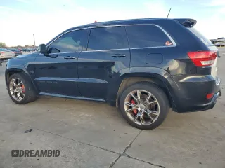 2012 Jeep Grand Cherokee SRT8 with VIN 1C4RJFDJ9CC346867, listed as a Copart auction lot 86349154 with 125,130 mi miles and Salvage Title. Bid and sale history available at carsss.com. Image 2.