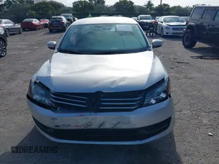 2013 Volkswagen Passat Wolfsburg Edition with VIN 1VWAP7A31DC065040, listed as a IAAI auction lot 42007311 with 133,510 mi miles. Bid and sale history available at carsss.com. Image 12.