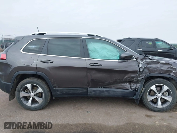 2020 Jeep Cherokee Limited with VIN 1C4PJMDX4LD589884, listed as a IAAI auction lot 41917930 with 57,703 mi miles and . Bid and sale history available at DreamBid. Image 13.