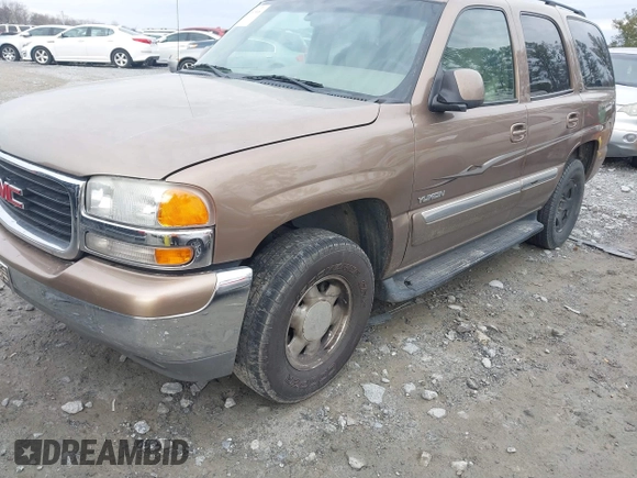 2003 GMC Yukon SLT with VIN 1GKEC13T73R126739, listed as a IAAI auction lot 41361906 with 166,748 mi miles. Bid and sale history available at carsss.com. Image 2.