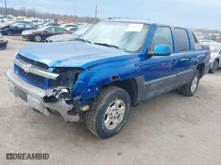 2003 Chevrolet Avalanche with VIN 3GNEK13T23G131174, listed as a IAAI auction lot 41649059 with 230,943 mi miles. Bid and sale history available at carsss.com. Image 2.