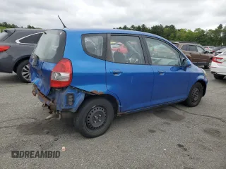 2007 Honda Fit with VIN JHMGD38497S020207, listed as a Copart auction lot 57447875 with 185,603 mi miles and Salvage title. Bid and sale history available at DreamBid. Image 3.