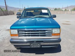 1993 Ford Explorer Eddie Bauer z VIN 1FMDU34X1PUD33031, wystawiony jako IAAI lot #42477303 z przebiegiem 65 324 mil mil oraz . Historia ofert i sprzedaży dostępna na DreamBid. Obrazek 6.