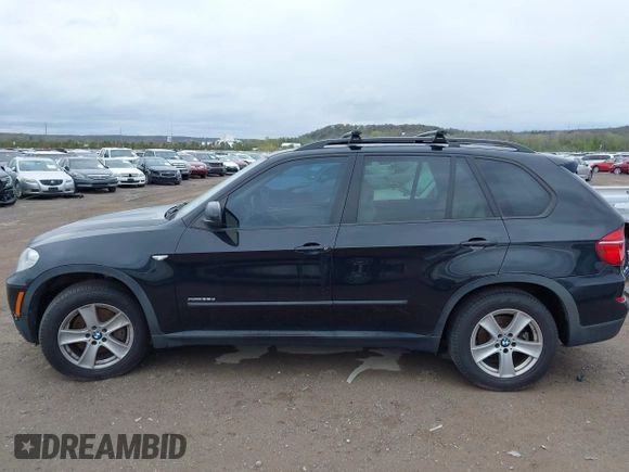 2012 BMW X5 35d z VIN 5UXZW0C55CL674191, wystawiony jako IAAI lot #41906713 z przebiegiem 143 687 mil mil oraz . Historia ofert i sprzedaży dostępna na DreamBid. Obrazek 15.