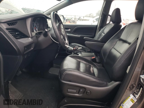 2016 Toyota Sienna SE with VIN 5TDXK3DCXGS738443, listed as a Copart auction lot 82042174 with 108,761 mi miles and Salvage title. Bid and sale history available at DreamBid. Image 7.