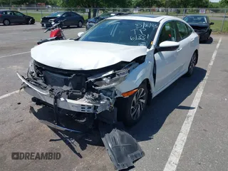 2017 Honda Civic EX z VIN 19XFC2F71HE061331, wystawiony jako IAAI lot #42319287 z przebiegiem 200 730 mil mil oraz . Historia ofert i sprzedaży dostępna na DreamBid. Obrazek 6.