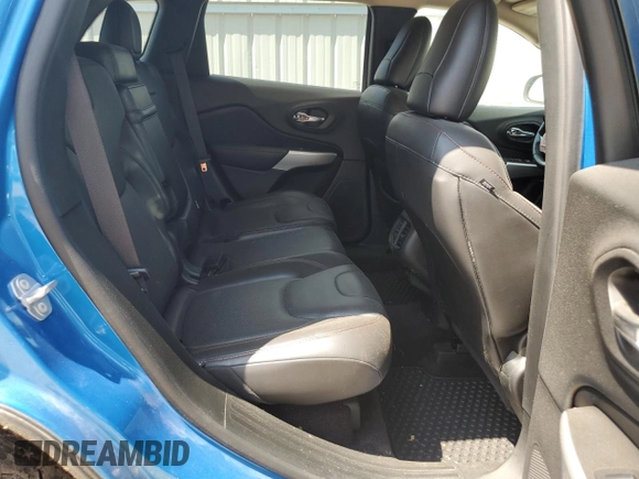 2018 Jeep Cherokee Trailhawk z VIN 1C4PJMBX0JD562021, wystawiony jako Copart lot #59136885 z przebiegiem 122 792 mil mil oraz Szkoda całkowita • Salvage title. Historia ofert i sprzedaży dostępna na DreamBid. Obrazek 11.