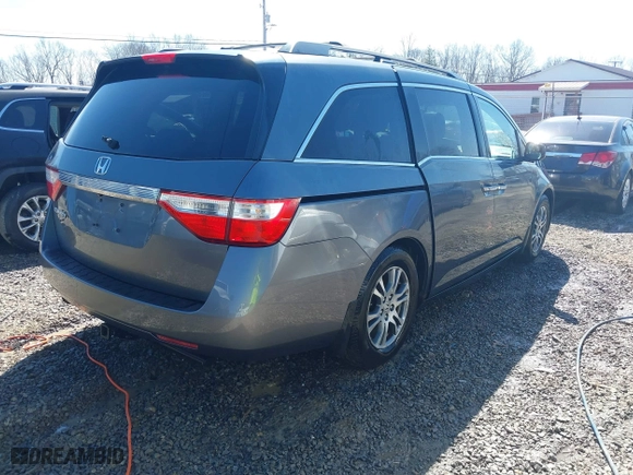 2013 Honda Odyssey EX-L with VIN 5FNRL5H66DB041471, listed as a IAAI auction lot 41543113 with 171,612 mi miles. Bid and sale history available at carsss.com. Image 4.