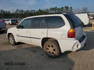 2006 GMC Envoy SLT with VIN 1GKDS13S962230376, listed as a Copart auction lot 43613965 with 136,462 mi miles and Salvage Title. Bid and sale history available at carsss.com. Image 2.