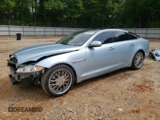 2013 Jaguar XJ with VIN SAJWA1C77D8V41738, listed as a Copart auction lot 53796225 with 104,063 mi miles and Salvage Title. Bid and sale history available at DreamBid. Image 1.