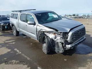 2021 Toyota Tacoma 4WD SR5 with VIN 3TMDZ5BN1MM105694, listed as a IAAI auction lot 41233853 with 1 mi miles. Bid and sale history available at carsss.com. Image 1.