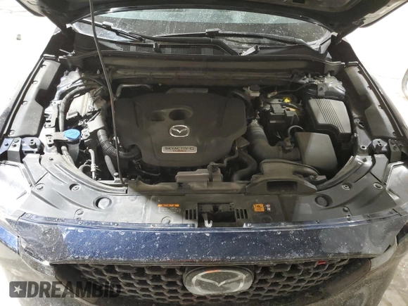 2022 Mazda CX-5 2.5 Turbo with VIN JM3KFBAY1N0636626, listed as a Copart auction lot 52257685 with 41,329 mi miles and Salvage Title. Bid and sale history available at carsss.com. Image 13.