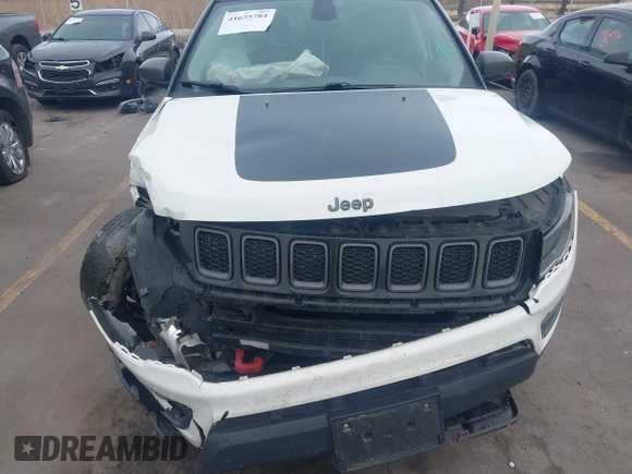 2018 Jeep Compass Trailhawk with VIN 3C4NJDDB9JT174899, listed as a IAAI auction lot 41635784 with 124,656 mi miles and . Bid and sale history available at DreamBid. Image 11.