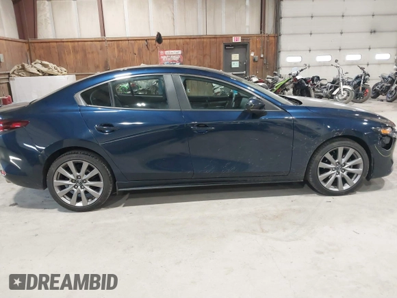 2021 Mazda 3 Select with VIN 3MZBPBBL3MM251893, listed as a IAAI auction lot 41854476 with 56,661 mi miles and . Bid and sale history available at DreamBid. Image 13.