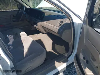 1999 Ford Crown Victoria LX with VIN 2FAFP74W7XX185341, listed as a IAAI auction lot 42020186 with 178,997 mi miles. Bid and sale history available at carsss.com. Image 5.