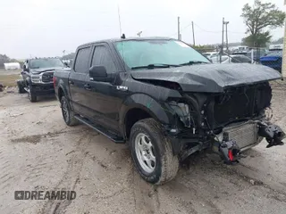 2018 Ford F-150 XL with VIN 1FTEW1EG6JKC25917, listed as a IAAI auction lot 41345876 with 144,669 mi miles. Bid and sale history available at carsss.com. Image 1.