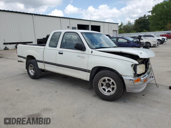 1995 Toyota T100 DX with VIN JT4VD12E2S0009844, listed as a Copart auction lot 51738525 with 357,475 mi miles and Salvage Title. Bid and sale history available at carsss.com. Image 4.