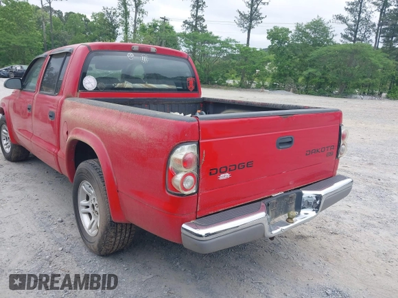 2004 Dodge Dakota SLT with VIN 1D7HL48N84S717599, listed as a IAAI auction lot 42132810 with 305,900 mi miles and . Bid and sale history available at carsss.com. Image 3.