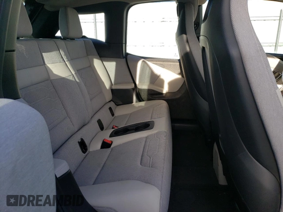 2016 BMW i3 z VIN WBY1Z2C53GV556649, wystawiony jako Copart lot #43965855 z przebiegiem 42 861 mil mil oraz Szkody całkowita. Historia ofert i sprzedaży dostępna na DreamBid. Obrazek 11.