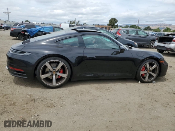 2024 Porsche 911 Carrera S with VIN WP0AB2A92RS218949, listed as a Copart auction lot 57306844 with 1,296 mi miles and Salvage Title. Bid and sale history available at carsss.com. Image 3.