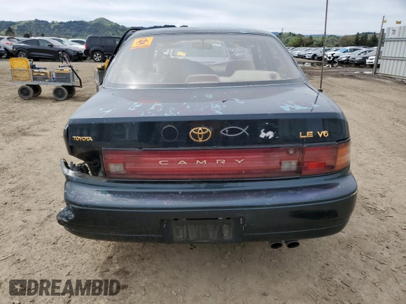 1994 Toyota Camry LE z VIN JT2GK12E2R0039606, wystawiony jako Copart lot #49840015 z przebiegiem 197 834 mil mil oraz Szkoda całkowita • Salvage title. Historia ofert i sprzedaży dostępna na DreamBid. Obrazek 6.