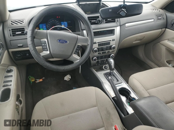 2011 Ford Fusion Hybrid с VIN 3FADP0L39BR214920, выставлен на аукционе Copart как лот 57888465 с пробегом 133 656 миль миль и Списание • Salvage title. История ставок и продаж доступна на DreamBid. Изображение 8.