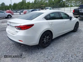 2014 Mazda 6 i Grand Touring with VIN JM1GJ1W67E1139945, listed as a IAAI auction lot 42194243 with 205,545 mi miles. Bid and sale history available at carsss.com. Image 4.