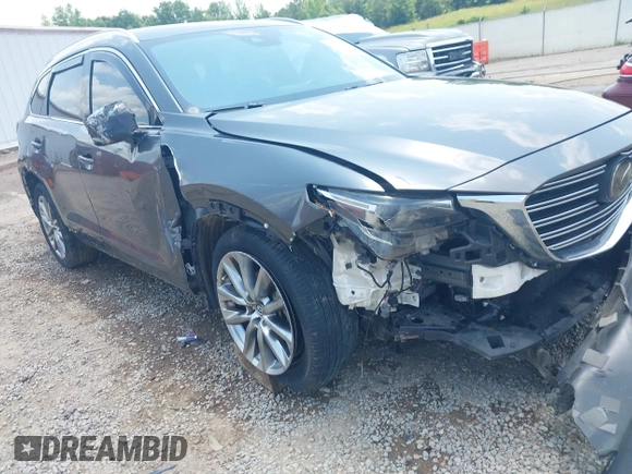 2018 Mazda CX-9 Grand Touring with VIN JM3TCADY7J0217595, listed as a IAAI auction lot 42381331 with 130,604 mi miles and . Bid and sale history available at DreamBid. Image 17.