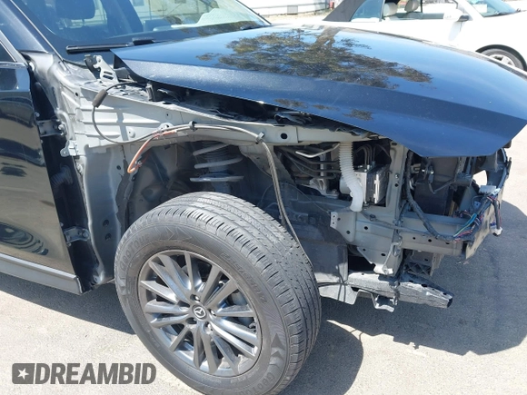 2019 Mazda CX-5 Sport with VIN JM3KFABM7K1509987, listed as a IAAI auction lot 42062804 with 50,898 mi miles and . Bid and sale history available at DreamBid. Image 18.