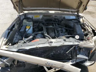 1993 Jeep Cherokee Sport с VIN 1J4FJ68S5PL642734, выставлен на аукционе Copart как лот 60755325 с пробегом 259 553 миль миль и Списание • Salvage title. История ставок и продаж доступна на DreamBid. Изображение 11.