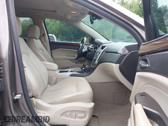 2012 Cadillac SRX Premium Collection z VIN 3GYFNCE3XCS620507, wystawiony jako IAAI lot #42348835 z przebiegiem 184 737 mil mil oraz . Historia ofert i sprzedaży dostępna na DreamBid. Obrazek 5.