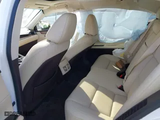 2016 Lexus ES 300h Hybrid with VIN JTHBW1GG0G2101603, listed as a IAAI auction lot 41677725 with 148,182 mi miles. Bid and sale history available at carsss.com. Image 8.